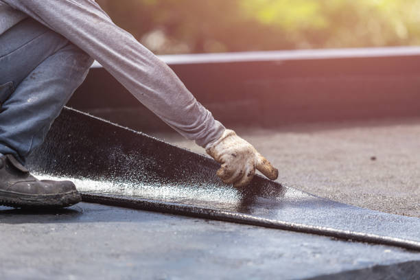 Professional Waterproofing technician working in Sea Cliff, NY